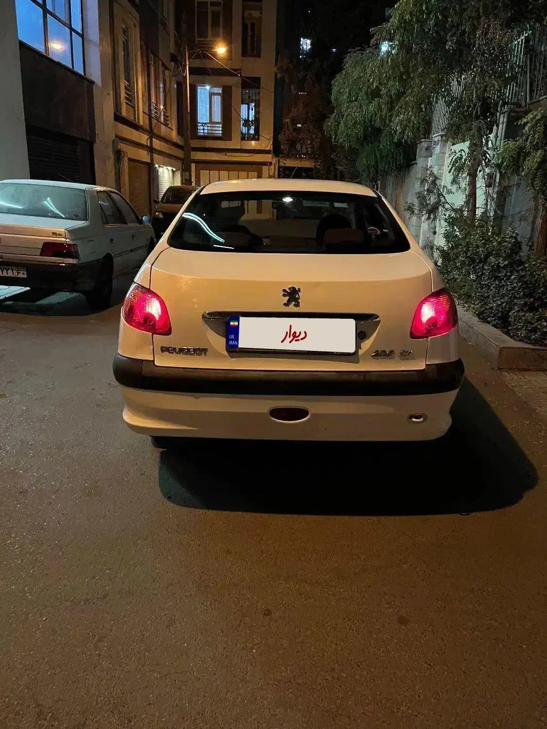 پژو ۲۰۶ صندوق دار v8 - 1394