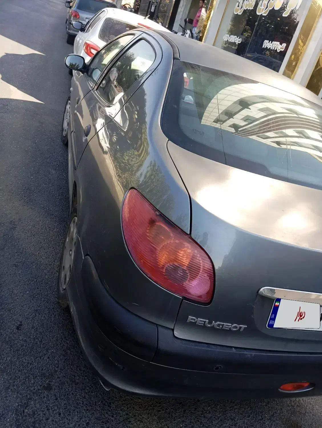 پژو ۲۰۶ صندوق دار v8 - 1393