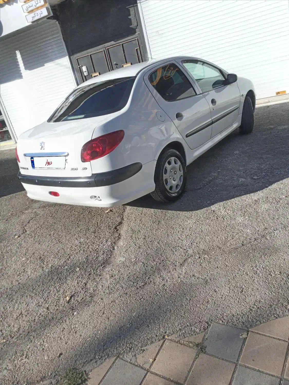 پژو ۲۰۶ صندوق دار v8 - 1398