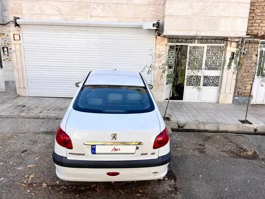 پژو ۲۰۶ صندوق دار v8 - 1394