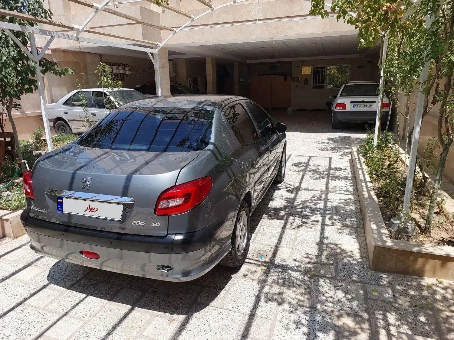 پژو ۲۰۶ صندوق دار v8 - 1398