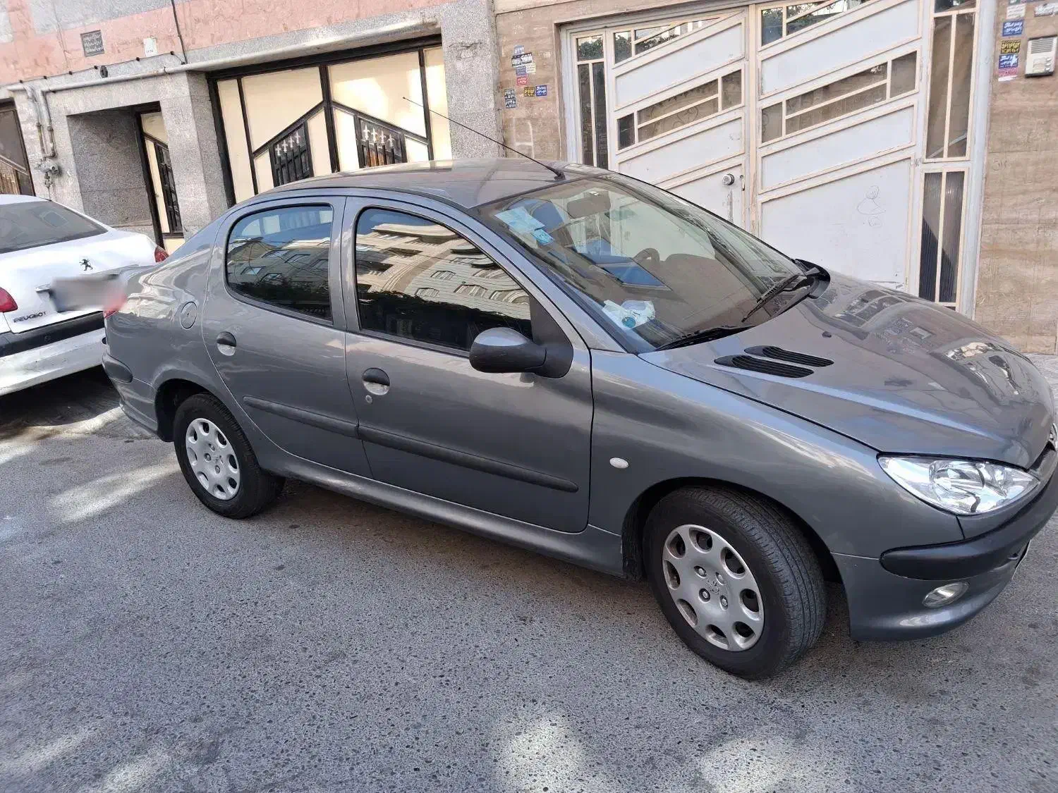 پژو ۲۰۶ صندوق دار v8 - 1396