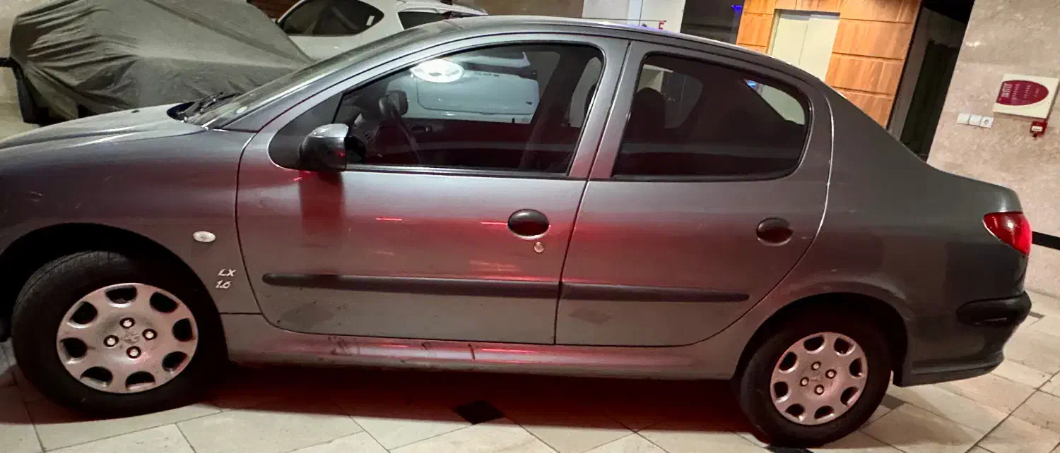 پژو ۲۰۶ صندوق دار v8 - 1396