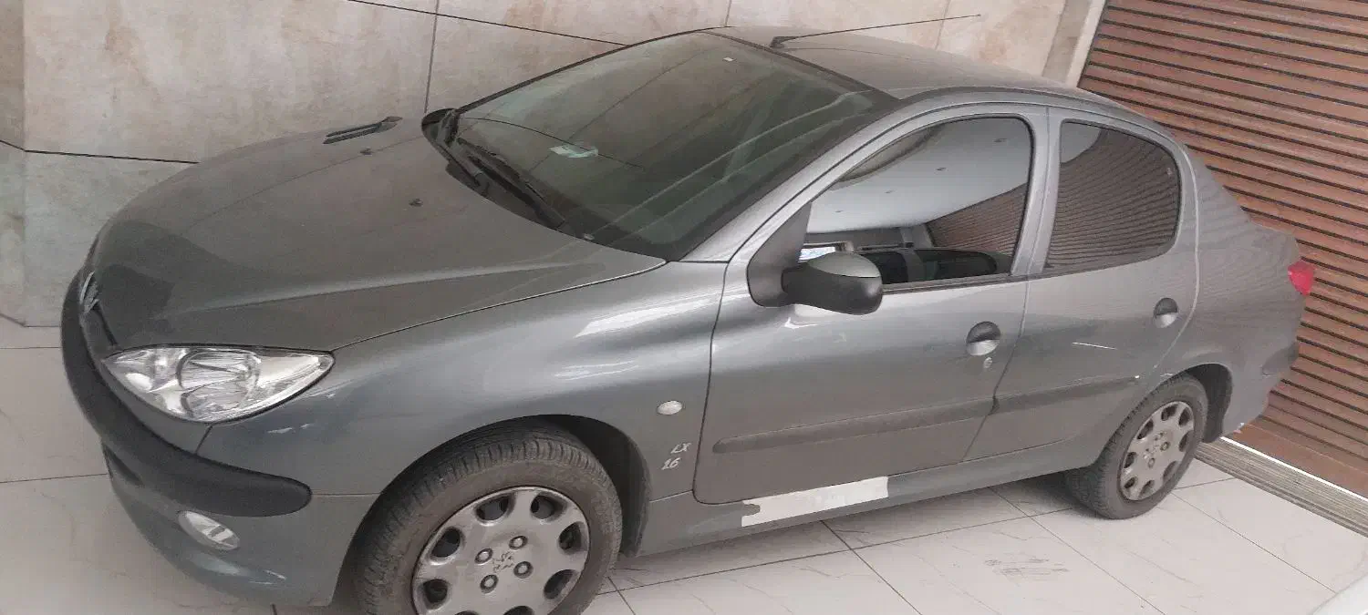 پژو ۲۰۶ صندوق دار v8 - 1396