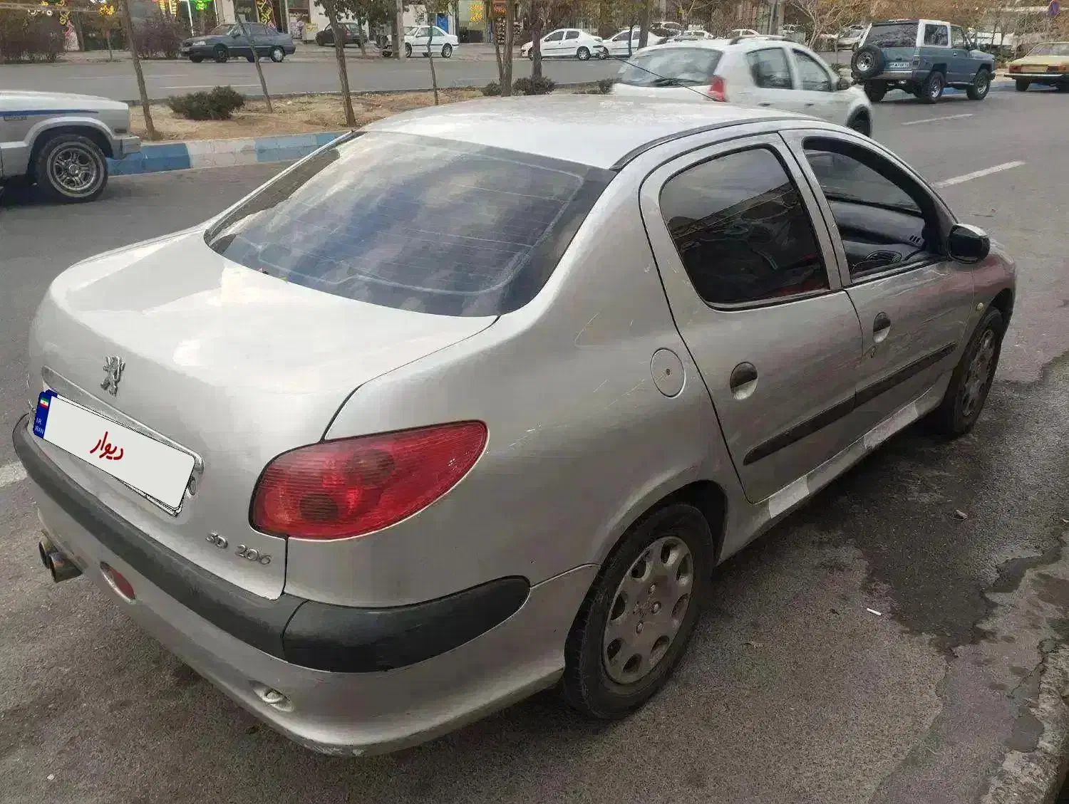 پژو ۲۰۶ صندوق دار v8 - 1385