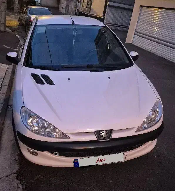 پژو ۲۰۶ صندوق دار v8 - 1396