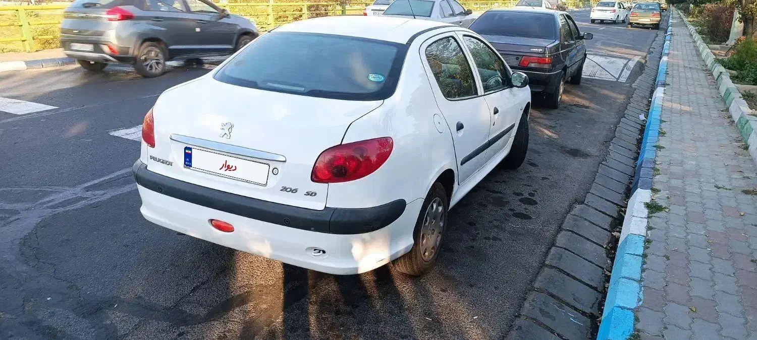 پژو ۲۰۶ صندوق دار v8 - 1396