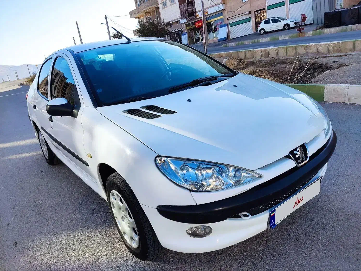 پژو ۲۰۶ صندوق دار v8 - 1396