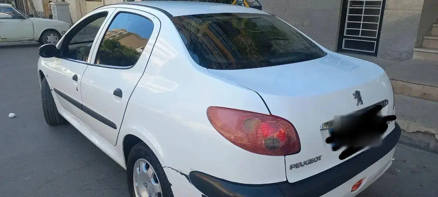 پژو ۲۰۶ صندوق دار v8 - 1391