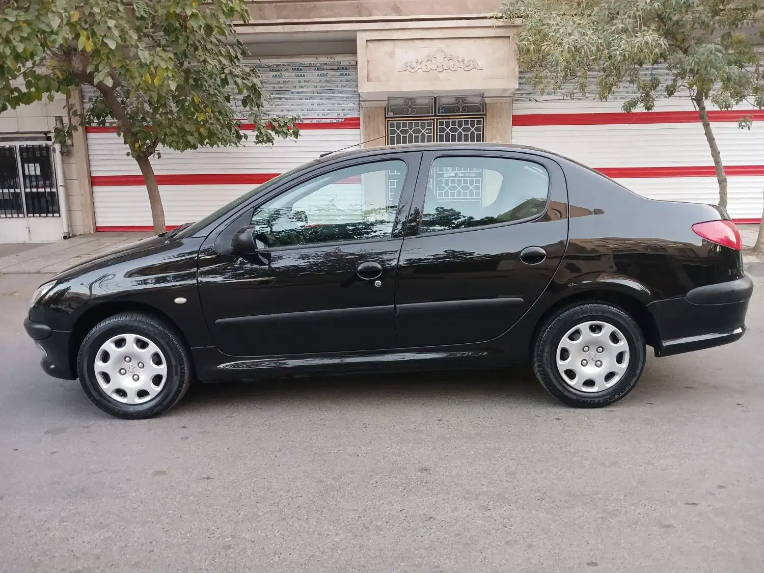 پژو ۲۰۶ صندوق دار v8 - 1394